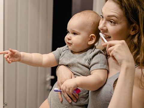 CURBING CAVITIES | When toothbrush heads are placed close to each other, you could transfer the bacteria and germs indirectly to your loved ones, dentists say.