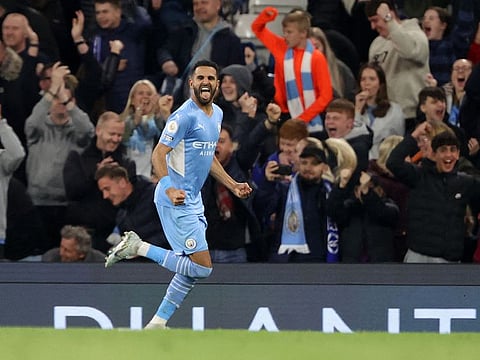 Manchester City's Riyad Mahrez celebrates scoring their first goal.