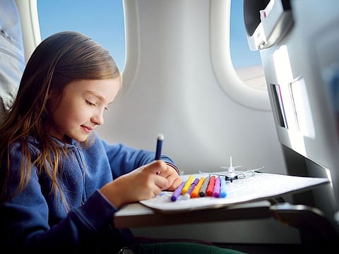 Carry some in-flight entertainment, whether it be picture books or an iPad with pre-loaded movies.