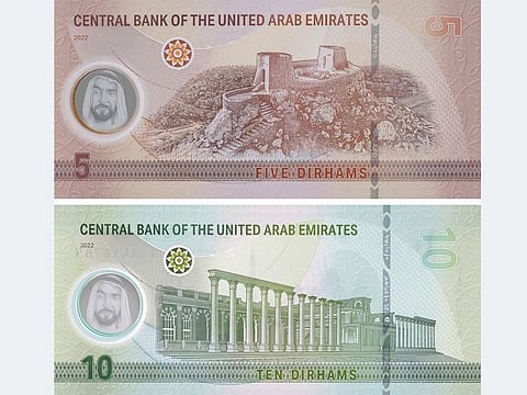 Pictures of UAE national and cultural symbols are included in the design.