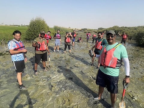 Dulsco volunteers during the mangrove plantation campaign to mark the Earth Day