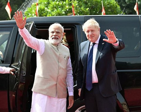 India's Prime Minister Narendra Modi welcomes the Prime Minister of the United Kingdom Boris Johnson, at the Ceremonial Reception, at Rashtrapati Bhawan, in New Delhi on Friday, April 22, 2022.