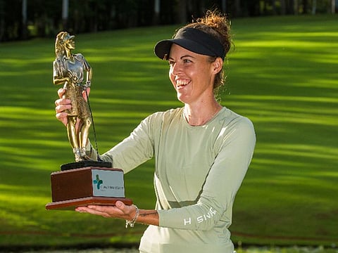 Winner Meghan MacLaren with the trophy.