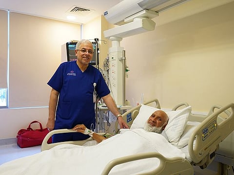Islam Gul, a 65-year-old Pakistani patient with Dr. Waleed Yasin Kadro, Consultant Interventional Cardiologist at RAK Hospital.