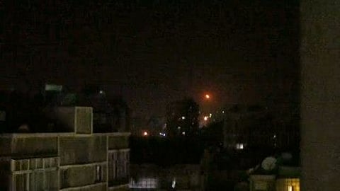 A handout picture released by the official Syrian Arab News Agency (SANA) on April 27, 2022, shows light the sky during Israeli air strikes before dawn near the capital Damascus.