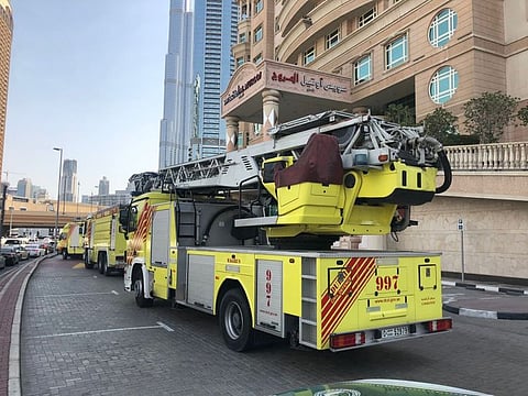 Firefighters at the Dubai hotel where a fire was reported on Tuesday afternoon.