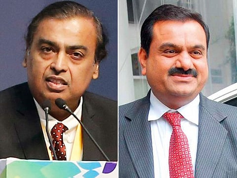 Mukesh Ambani, left, and Gautam Adani