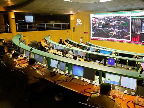 Police officers at work at the Dubai Police Command and Control Centre in Dubai.