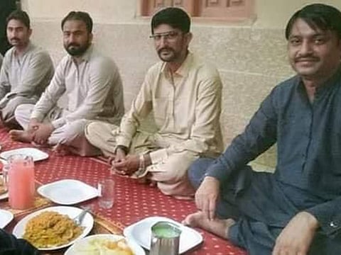 Sushil Kumar (right, in blue) breaking fast with his Muslim friends in Mithi, Tharparkar.