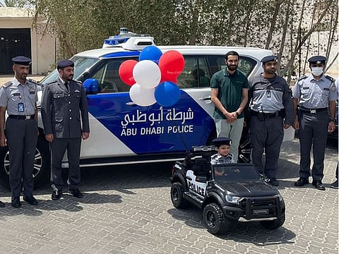 Police officials visited Omar at his home in Al Ain and also handed him a police uniform to go with his new electric car