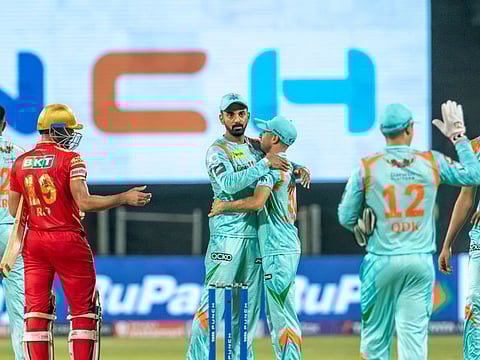 Lucknow Super Giants celebrate their win with captain KL Rahul over Punjab Kings at the MCA International Stadium in Pune.