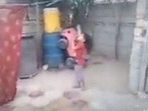 In the video, the man tells viewers that he will be entertaining them with a “small activity” and show them his marksmanship.