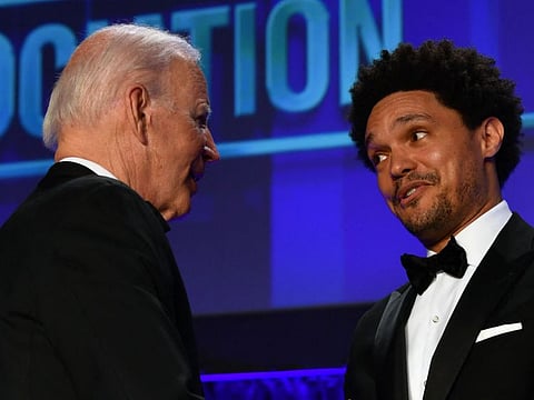 US President Joe Biden with South African comedian Trevor Noah during the White House Correspondents Association gala at the Washington Hilton Hotel in Washington, DC, on April 30, 2022.