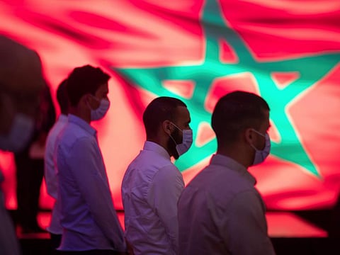 Inmates convicted on terror charges sing the Moroccan national anthem during a ceremony that is part of a reconciliation program to rehabilitate and de-radicalize them, in Sale, Morocco.