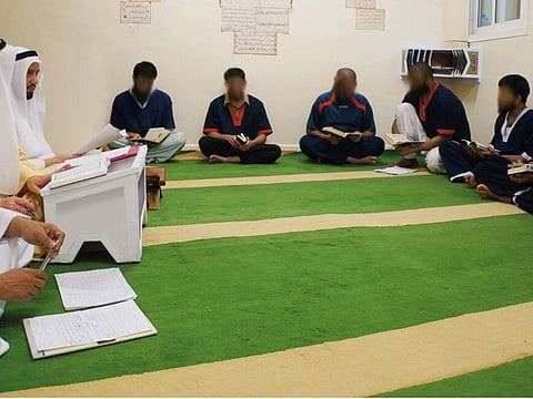 Inmates in Ajman studying the Quran during Ramadan 2022