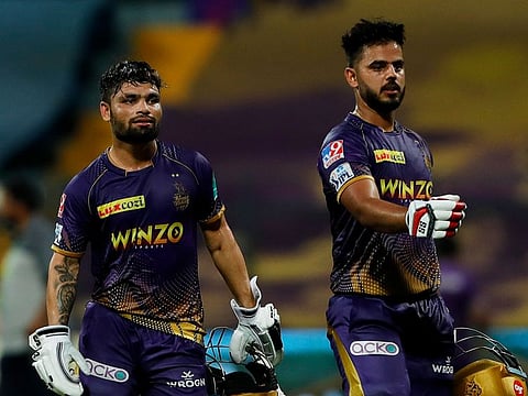 Unlikely hero: Man of the Match Rinku Singh (left) and Nitish Rana celebrate Kolkata's seven-wicket win over Rajasthan Royals at Wankhede Stadium on Monday.