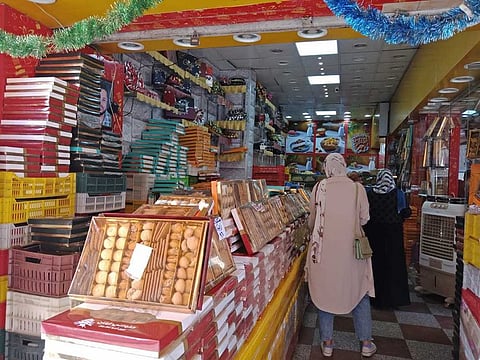 Festive cookies and biscuits, a popular feature of Eid Al Fitr in Egypt, are displayed at pastry stores in Cairo.