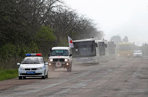A bus convoy carrying evacuees from Mariupol area is seen on a road on the way to Zaporizhzhia, during Ukraine-Russia conflict in the Donetsk Region, Ukraine May 2, 2022.