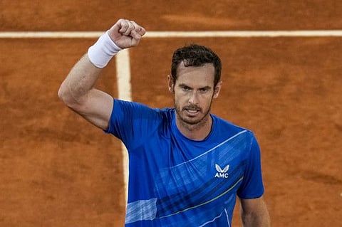 Andy Murray of Britain celebrates his victory over Dominic Thiem of Austria during their match at the Mutua Madrid Open on Monday.