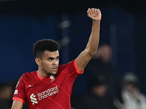 Luis Diaz celebrates scoring his team's second goal .