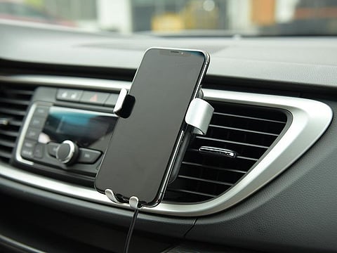 Charge your phone on the go without cable clutter. Picture for illustrative purposes only.