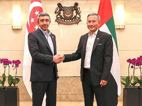 Sheikh Abdullah with Singapore Foreign Minister Dr. Vivian Balakrishnan.