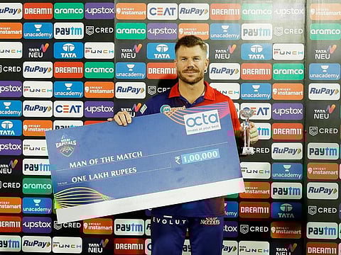 David Warner of Delhi Capitals with the Man of The Match award after he scored 92 runs against Hyderabad in match 50 of the IPL.