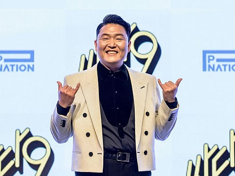 South Korean singer Psy poses as he arrives at a press conference to promote his ninth album Psy 9th" at a hotel in Seoul on April 29, 2022.