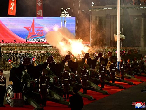 Troops perform a gun salute during the parade to mark the 90th anniversary of the founding of the Korean People's Revolutionary Army in Pyongyang, North Korea, in this undated photo released by North Korea's Korean Central News Agency (KCNA) on April 26, 2022.