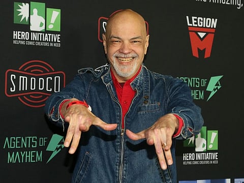 In this file photo taken on January 30, 2019, comic book artist George Perez arrives for Excelsior! A Celebration of The Amazing, Fantastic, Incredible and Uncanny Life Of Stan Lee at TCL Chinese Theatre in Hollywood, California. - Perez, an acclaimed comic book artist and writer known for his influential work on such superhero titles as the Avengers, Wonder Woman and the Teen Titans, has died, Marvel and DC Comics announced. Perez was 67. He revealed last year that he was battling pancreatic cancer. "George Perez was an artist, a writer, a role model and a friend," Marvel Entertainment said on Twitter. "His work paved seminal stories across comics, and his legacy of kindness and generosity will never be forgotten."
