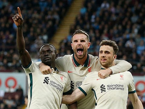 Liverpool's Sadio Mane celebrates scoring their second goal with Diogo Jota and Jordan Henderson.