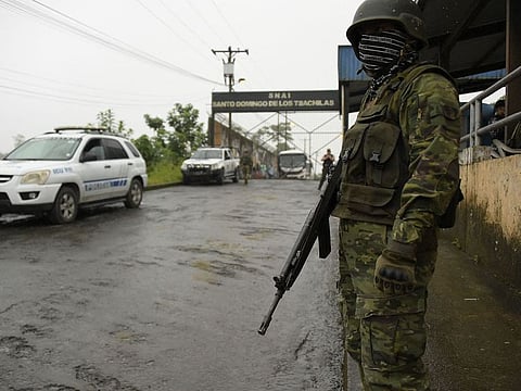 A soldier stands guard outside the Bellavista prison in Santo Domingo de los Tsachilas, Ecuador, on May 10, 2022, a day after a riot.