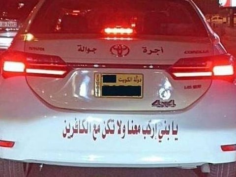 The Interior Ministry said the taxi had been taken to a traffic impoundment garage because its driver had pasted on the vehicle posters violating law.