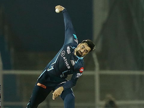 Rashid Khan of the Gujarat Titan in action during a Tata Indian Premier League 2022 game.
