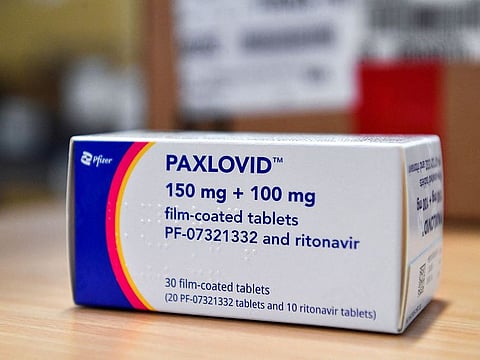 FILE PHOTO: Coronavirus disease (COVID-19) treatment pill Paxlovid is seen in a box, at Misericordia hospital in Grosseto, Italy.