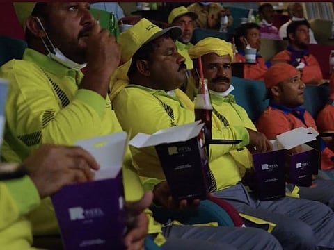 Still from a Dubai Municipality video showing the audience during the movie