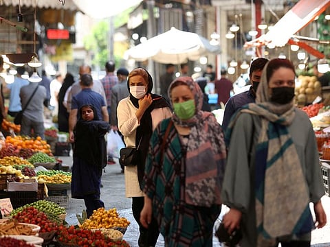 Iranian shoppers at a Tehran market. The arrests follow Iran's announcement this week that the cost of cooking oil, chicken, eggs and milk would rise by as much as 300%, as food prices surge across the Middle East due to global supply chain snarls and Russia's invasion of major food exporter Ukraine.