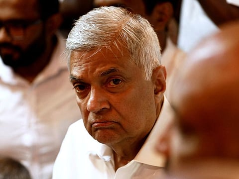 Ranil Wickremesinghe, newly appointed prime minister, arrives at a Buddhist temple after his swearing-in ceremony amid the country's economic crisis, in Colombo, Sri Lanka, May 12, 2022.