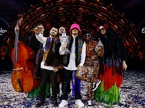 Kalush Orchestra from Ukraine pose after winning the 2022 Eurovision Song Contest in Turin, Italy, May 15, 2022.