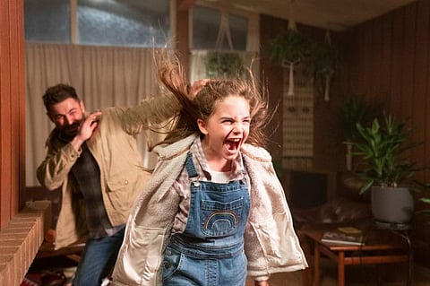 Andy (Zac Efron) and Charlie (Ryan Kiera Armstrong) in Firestarter, directed by Keith Thomas.