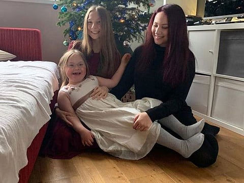 Antonia with her sisters.