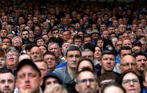 Everton fans look on during the Premier League match against Brentford at Goodison Park.