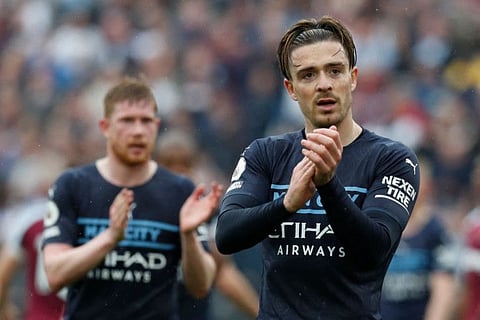 Manchester City's midfielder Jack Grealish reacts at the end of the Premier League match against West Ham United at the London Stadium, in London. It finished 2-2 and that has allowed Liverpool the chance to close the gap at the top but they must beat Southampton otherwise the race will be over.
