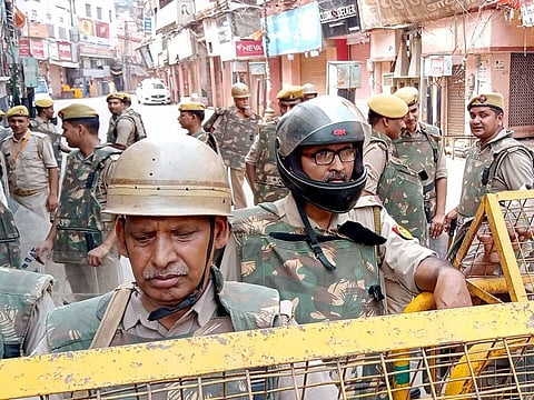 Security tightens near Kashi Vishwanath Temple-Gyanvapi Mosque complex as its court-mandated videography survey is completed on Monday, May 16, 2022, in Varanasi.