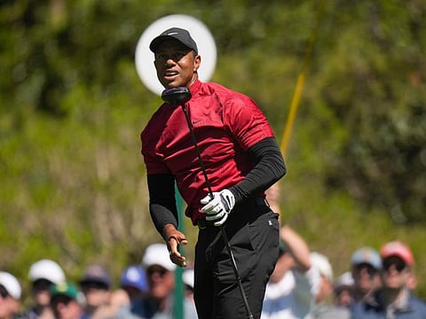 Tiger Woods watches his tee shot on the fifth hole during the final round at the Masters on April 10. The 15-time major champion feels better ahead of this week's PGA Championship.