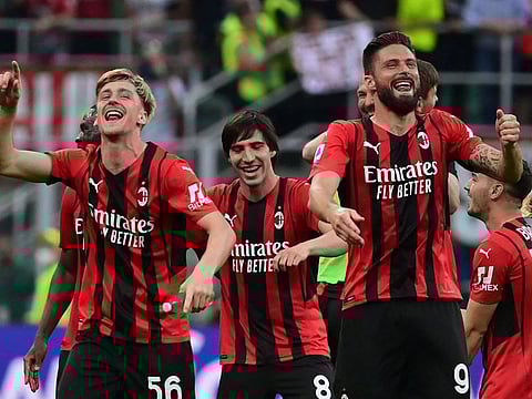 From left (file photo): AC Milan's Belgian midfielder Alexis Saelemaekers, AC Milan's Italian midfielder Sandro Tonali, AC Milan's French forward Olivier Giroud and AC Milan's Spanish midfielder Brahim Diaz celebrate their 2-0 win over Atalanta following the Italian Serie A football match between AC Milan and Atalanta Bergamo at the San Siro stadium in Milan on May 15, 2022.
