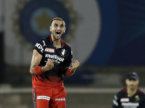 Royal Challengers Bangalore's Harshal Patel celebrates a dismissal against Punjab Kings during the Indian Premier League 2022 at the Brabourne Stadium in Mumbai on Friday.