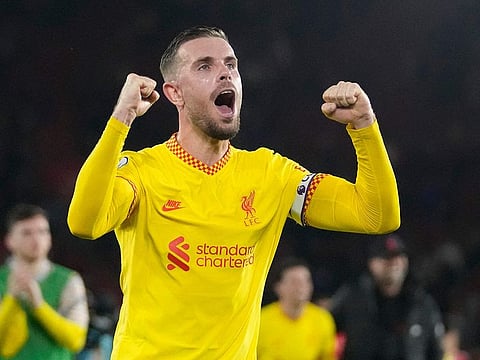 Liverpool’s Jordan Henderson reacts at the end of the win over Southampton at St. Mary’s Stadium in Southampton, Tuesday, May 17, 2022.