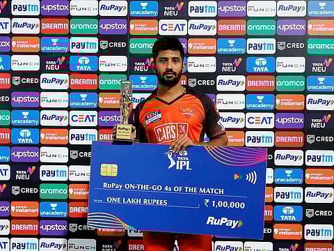 Rahul Tripathi enjoys the spotlight as the Man of the Match after their close win over Mumbai Indians on Tuesday.