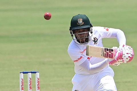 Bangladesh's Mushfiqur Rahim plays a shot during the fourth day of the first Test against Sri Lanka at the Zahur Ahmed Chowdhury Stadium in Chittagong on May 18, 2022. (Photo by Munir uz ZAMAN / AFP)